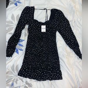 Large polkadot puffed shoulder dress ribbed in the waist